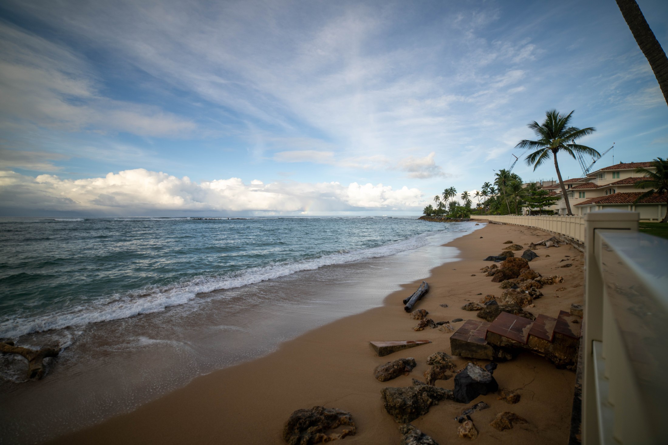 Sandy beach and calm Atlantic waves directly in front of Villa Paraíso