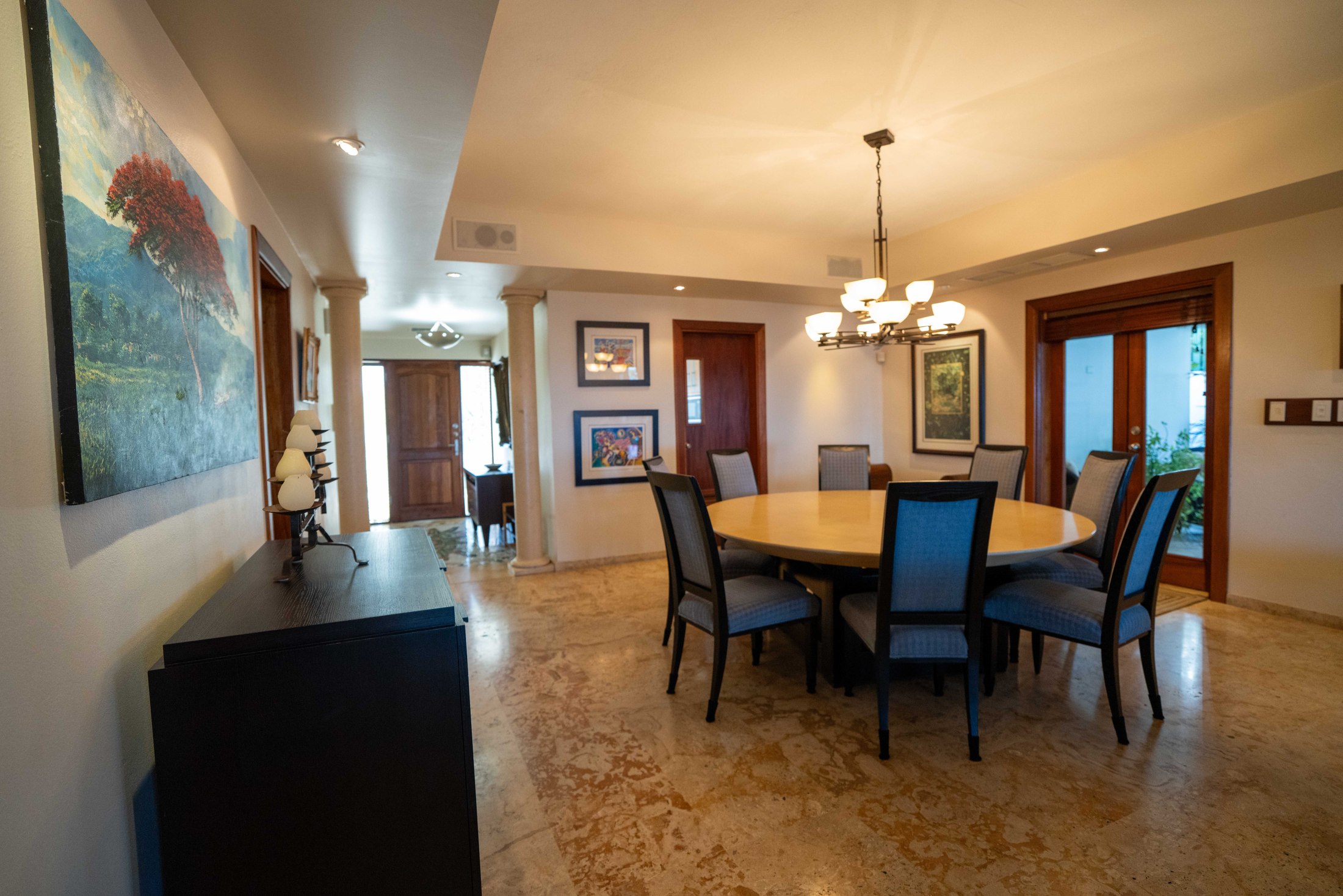 Round dining table with seating for eight