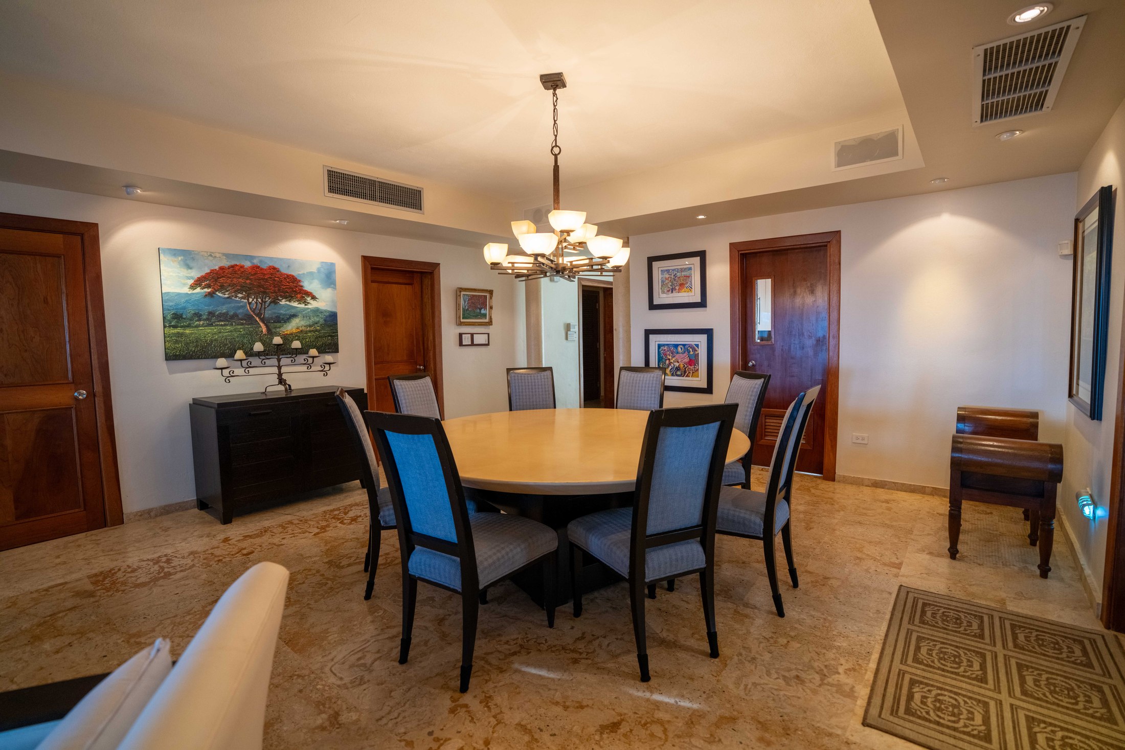 Dining area with artwork and natural light