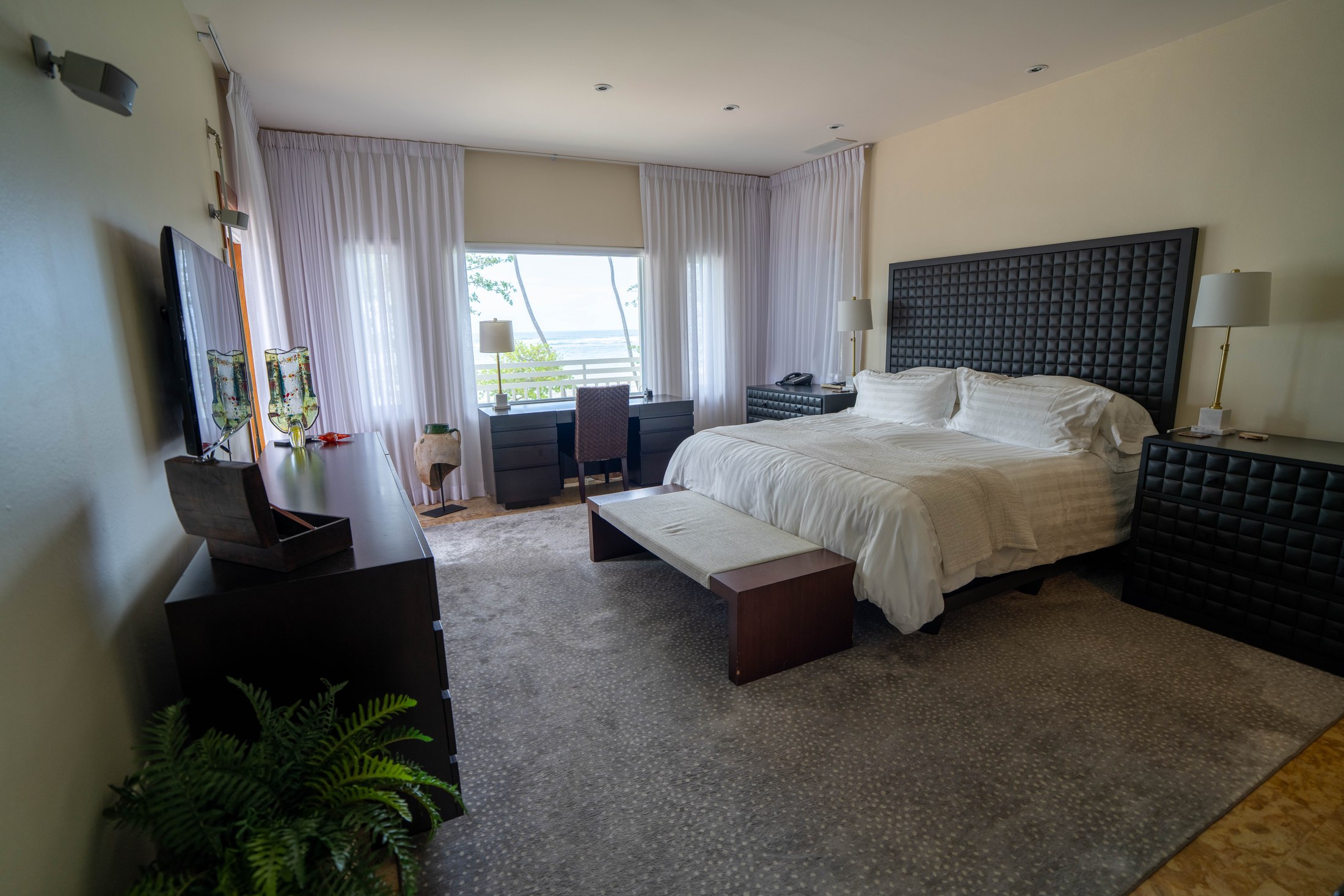 Second-floor master bedroom with ocean view and king bed