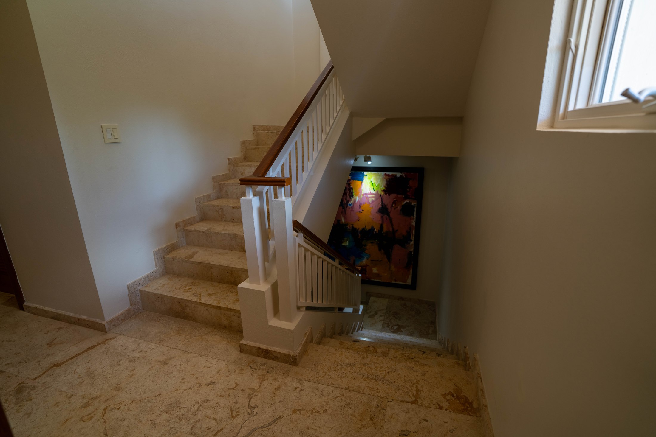Interior stairwell connecting the villa's three floors