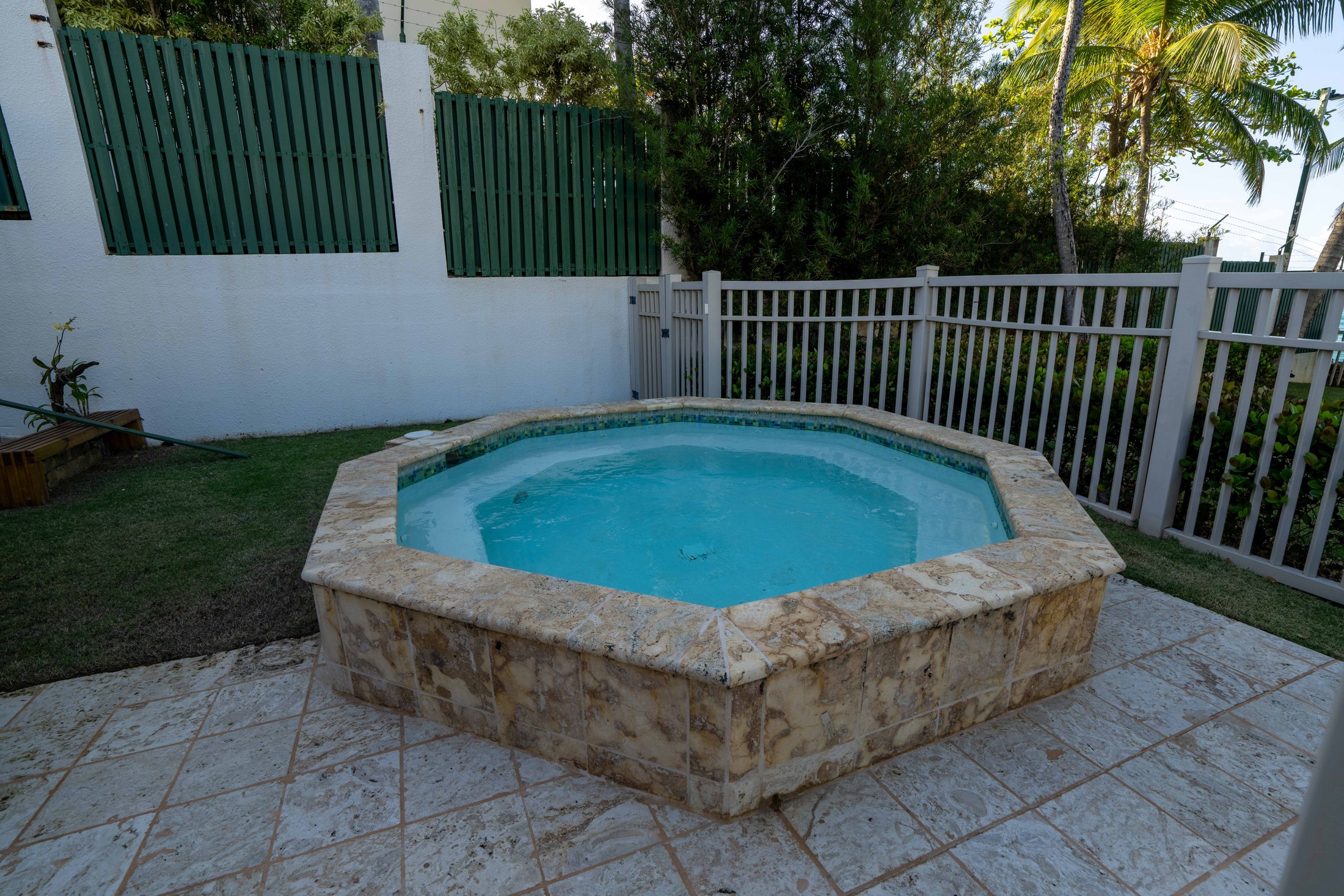 Private stone hot tub on the patio